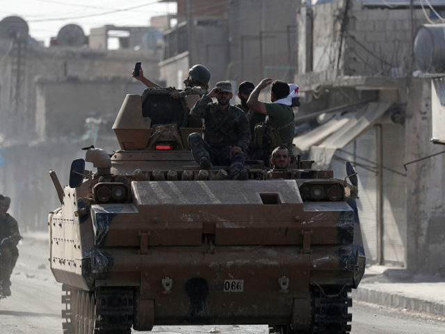 US troops ‘leave’ Kobani as Turkish incursion advances and Kurds make deal with Damascus
