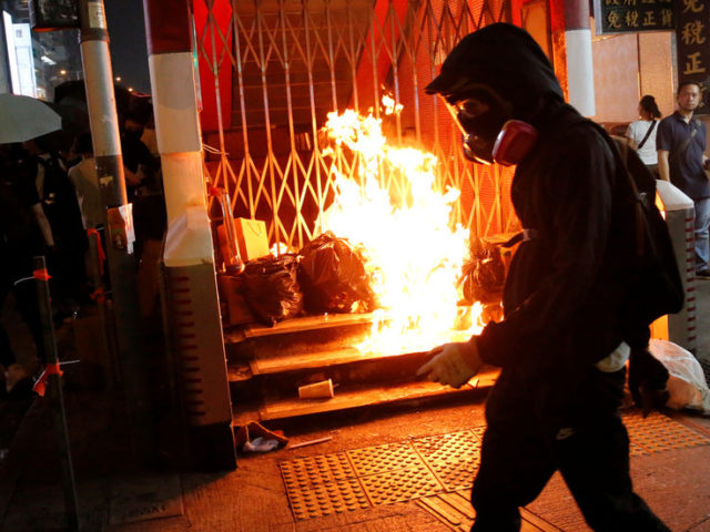 Hong Kong plunges into recession as months of violent protests take toll on economy