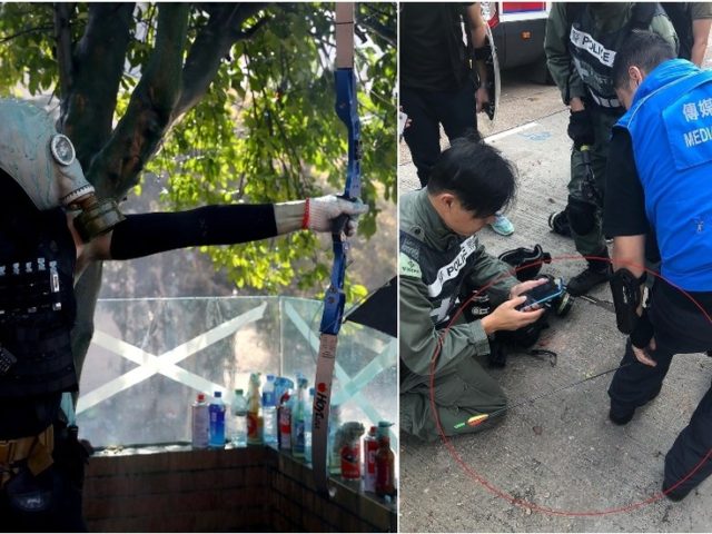 Hong Kong protesters hurl PETROL BOMBS at volunteers trying to clear roadblocks and shoot ARROWS at police