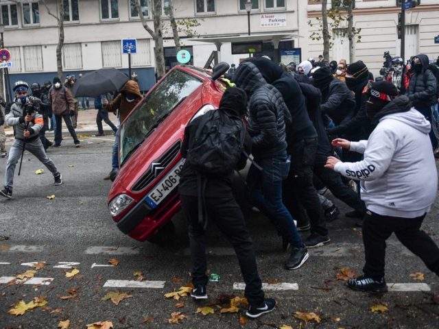 ‘Morons, bullies & thugs’: French interior minister hits back at ‘ultras’ at Yellow Vests after Saturday mayhem in Paris