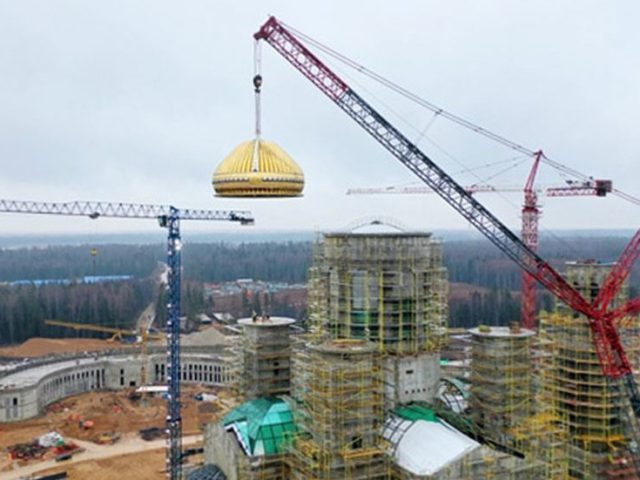 Got it covered: 34-ton titanium-decorated dome placed on top of Russia’s grand MILITARY CATHEDRAL