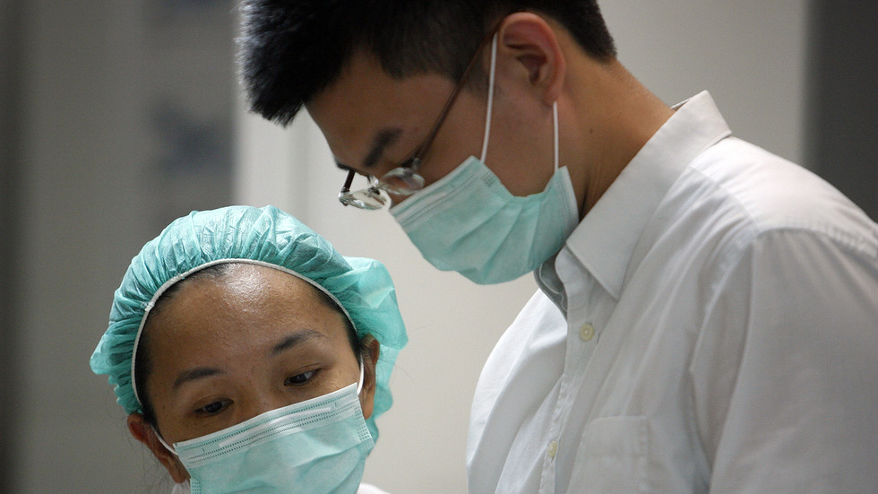 Health officials in Wuhan