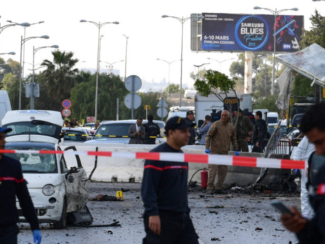 Policeman killed, several injured as militant bombers blow themselves up in front of US embassy in Tunis