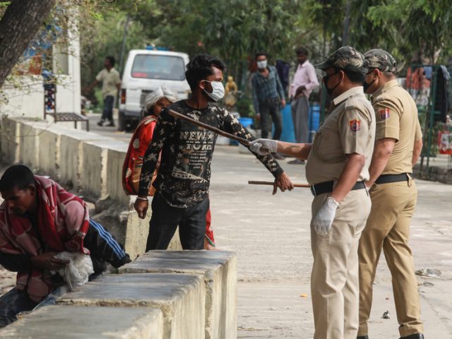 Indian cop gets hand CHOPPED OFF amid scuffle with blade-wielding men defying Covid-19 lockdown