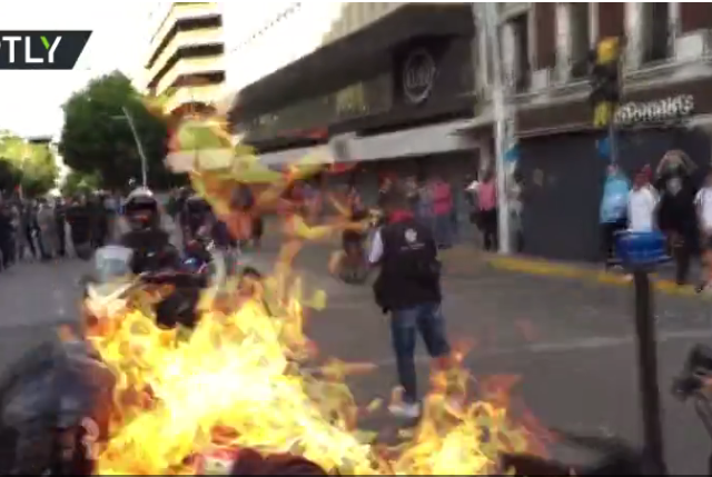 Patrol officer SET ON FIRE during police brutality protests over ‘Mexican George Floyd’ (VIDEO)