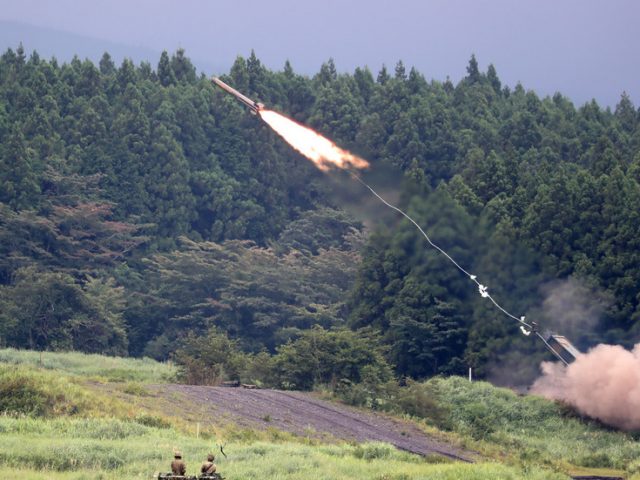 Japan scraps plans for US-made anti-missile sites, but mulls pre-emptive strike options instead