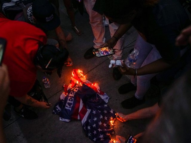 ‘If you burn the flag, you go to jail’: Trump says he wants a law criminalizing desecration of the symbol