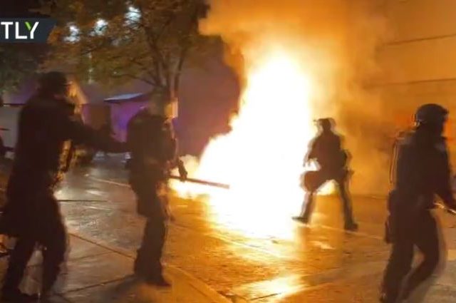 WATCH rioters throwing Molotov cocktails at police in Portland amid nationwide protests over Breonna Taylor case