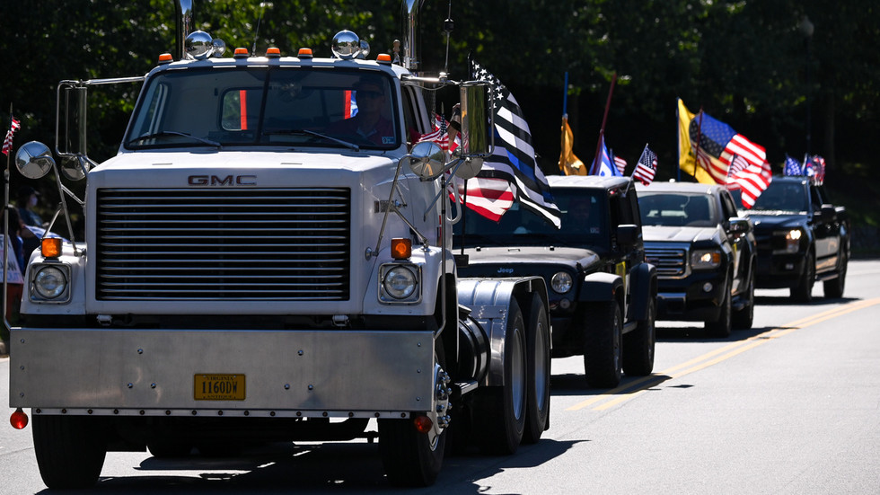A convoy of pickup trucks