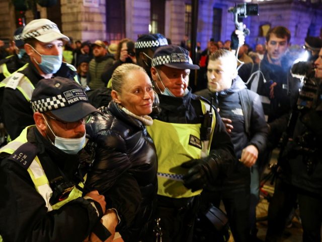Arrests & scuffles as Million Mask March staged in London despite Covid-19 lockdown