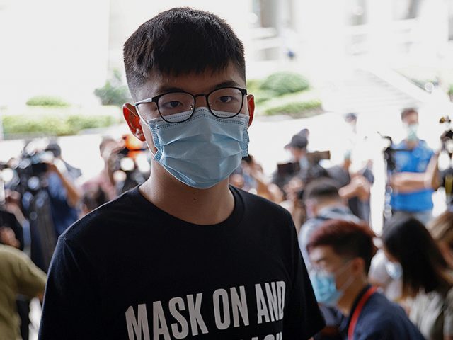 Hong Kong activist Joshua Wong sentenced to 13 months in prison after pleading guilty to organizing unauthorized assembly