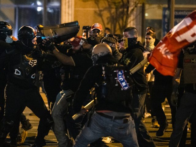 WATCH Trump supporters hit Antifa protesters with American flags during clashes in Washington state capital