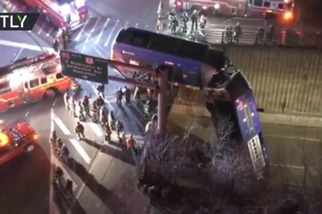 Tandem bus veers off New York road, leaving half DANGLING from overpass (PHOTOS, VIDEOS)