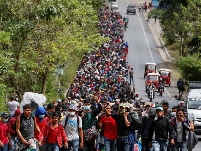 Over 7,000-strong migrant caravan inches closer to US border as Biden vows to end Trump’s asylum policies