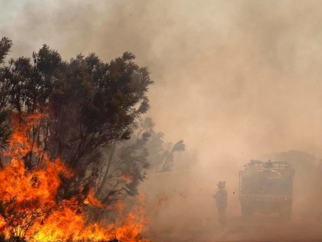 Unexploded bombs at military site hinder Australian firefighters tackling enormous ‘life-threatening’ blaze