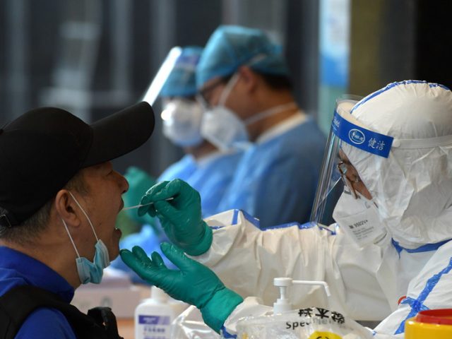 WHO chief ‘disappointed’ China still hasn’t approved entry of Covid-19 experts investigating pandemic origins