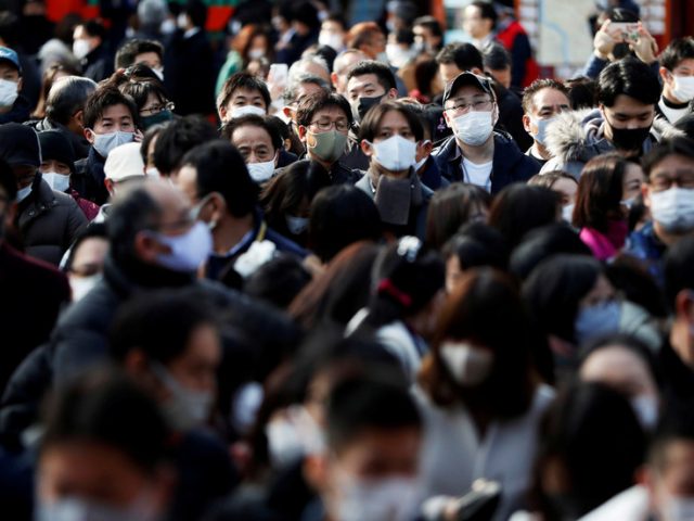 Tokyo faces state of emergency over coronavirus case surge as Japan prepares to host Olympics