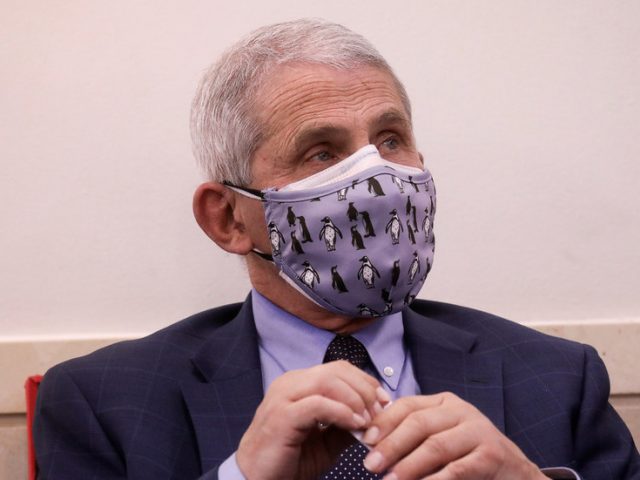 Keep that mask on: Fauci says face coverings could be needed even in 2022, as he defines new ‘normality’