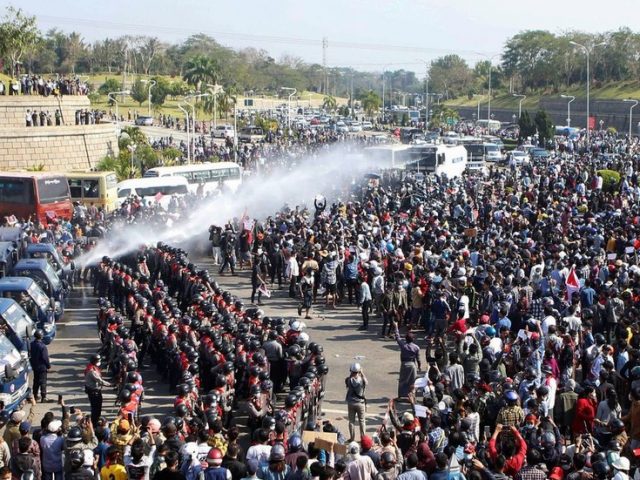 Myanmar police deploy water cannon as thousands continue protests against military coup (VIDEO)