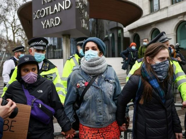 Met Police chief REFUSES to resign as protesters amass outside Scotland Yard over crackdown on Sarah Everard mourners (VIDEOS)