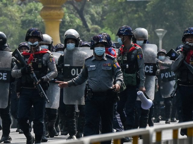Myanmar riot police fire at crowd to disperse protesters, as military tries to reimpose rule after coup (VIDEO)