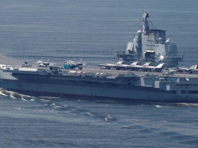 China vows to hold regular naval drills as its carrier group conducts exercises near Taiwan