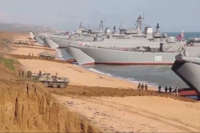 Russian troops depart Crimea for home bases after exercises, potentially signaling end to border standoff with Ukraine (VIDEO)