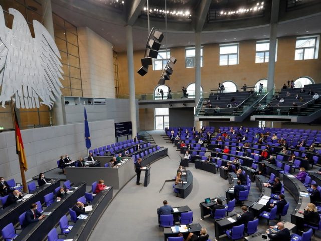‘As sorry as we are’: German lawmakers approve new controversial Covid-19 lockdown bill following heated debate