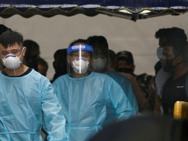 Singapore investigates 17 Covid-19 reinfections, quarantines 1,200 migrant workers