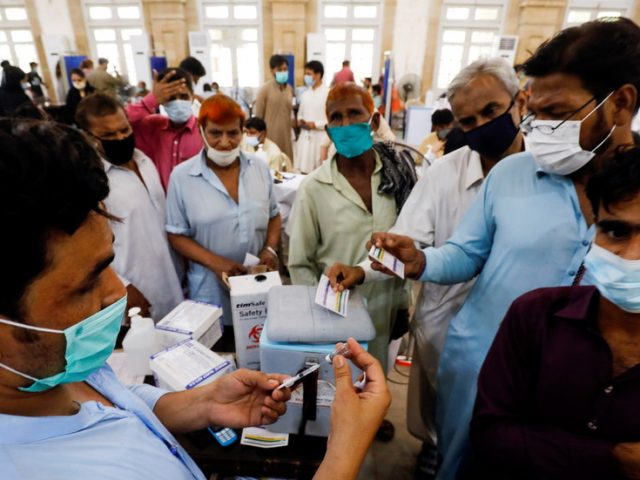 Pakistan mandates Covid-19 shots for public sector workers, vaccine passport needed for air travel, restaurants, and malls