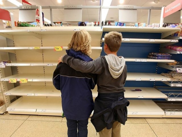Shelves stripped bare across UK as Brits rush to panic-buy ahead of Christmas