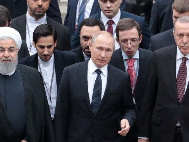 Erdogan hosts leaders of Russia & Iran as he pushes for border ‘safe zone’ in Idlib