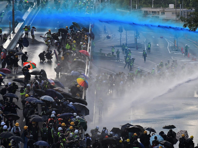Molotovs v water cannons: Violence continues during Hong Kong protests