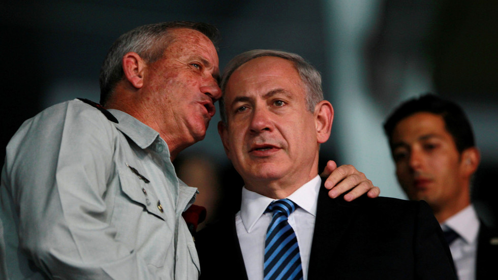 Benny Gantz and Benjamin Netanyahu are pictured together. Reuters Baz Ratner