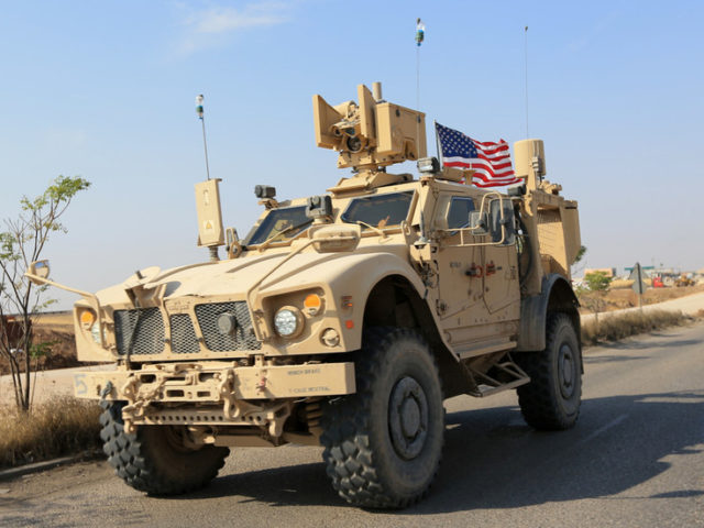 Just going next door: More than 100 armored vehicles cross into Iraq as US troops withdraw from northern Syria
