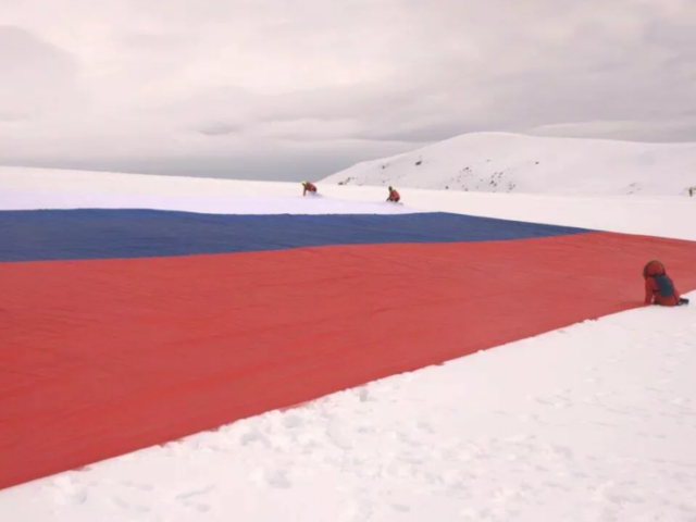 Putin’s bikers invade Antarctica, occupy abandoned base… all just to unfurl a GIANT Russian flag