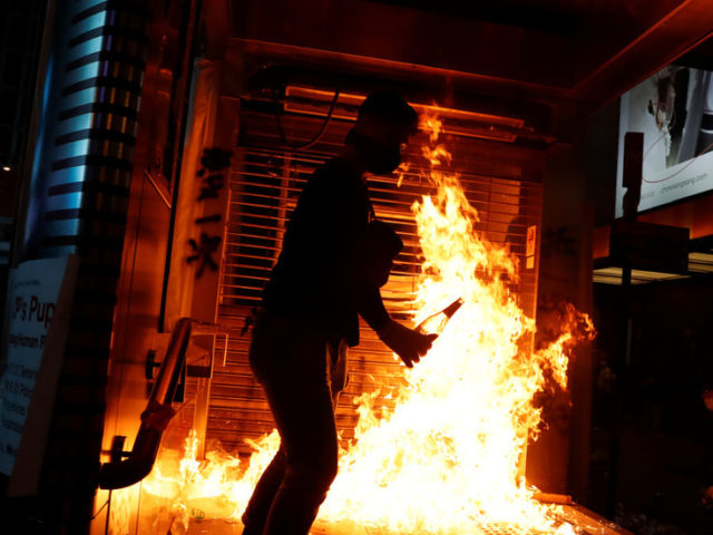 Hong Kong rioters SET MAN ON FIRE for not backing anti-China protests (DISTURBING VIDEO)