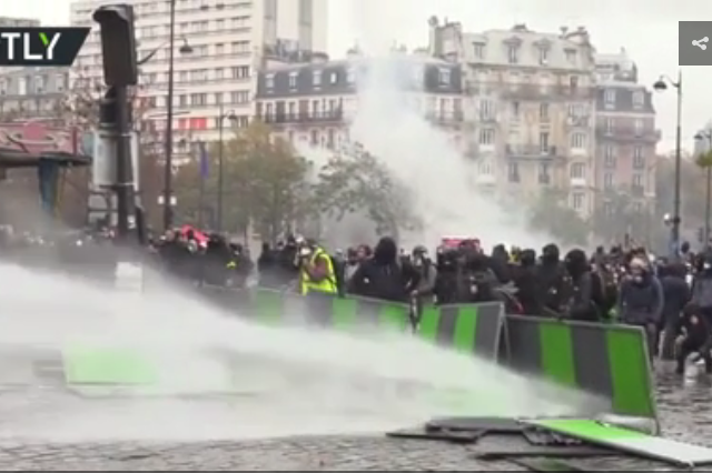 Water cannon deployed & cars flipped as tensions run high during Yellow Vests protests (VIDEOS)