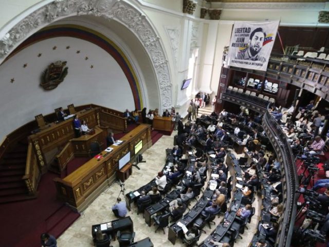 Opposition lawmakers participate in a session at the National Assembly in Caracas, Venezuela Four Opposition Lawmakers in Venezuela to Be Stripped of Immunity – Ruling
