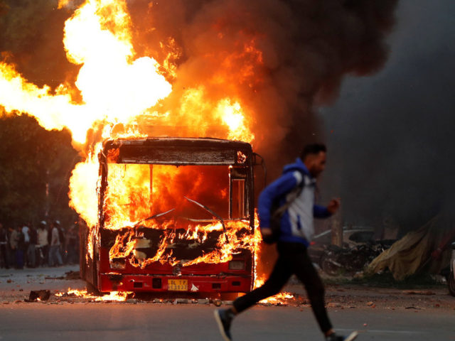 Protesters TORCH buses and clash with police in Delhi as Indian citizenship bill sparks street violence (PHOTOS, VIDEOS)