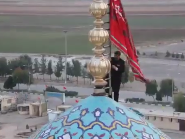 Blood Red ‘Flag of Revenge’ Raised at Shia Islam Holy Site as US-Iran Tensions Reach Boiling Point