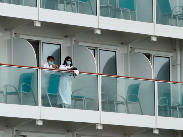 All 3,600 on board allowed to leave cruise ship quarantined in Hong Kong after crew test negative for coronavirus