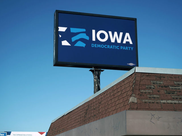 ‘Too perfect’: Iowa Dem Party sign falls off podium as chair struggles to explain caucus flop, Twitter sees a metaphor