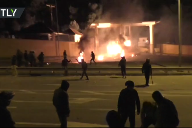 WATCH protesters hurl stones at police during second night of riots against migrant camps in Lesbos
