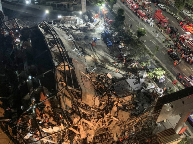Chinese hotel used as Covid-19 quarantine site COLLAPSES, trapping dozens under rubble (VIDEOS)