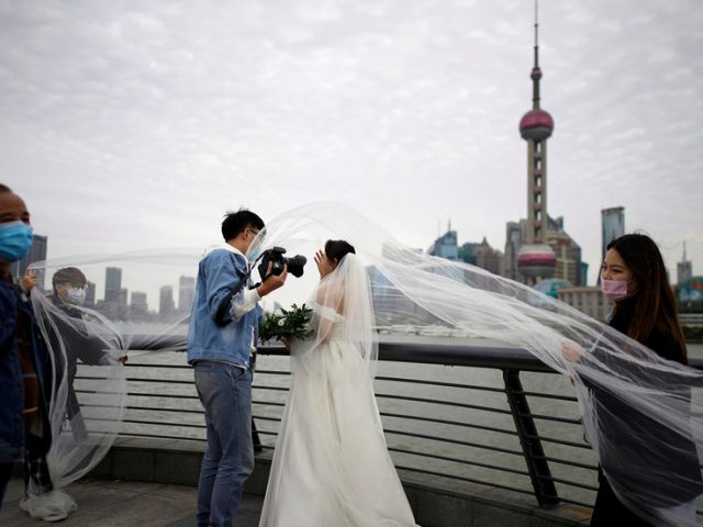 Wuhan couples BOMBARD marriage application app as coronavirus lockdown is lifted
