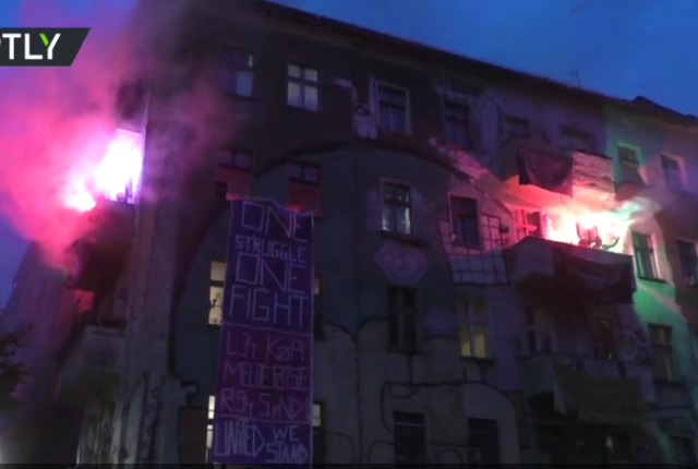 WATCH protesters light flares, gather for Walpurgis Night in Berlin despite ban on mass rallies during Covid-19 lockdown