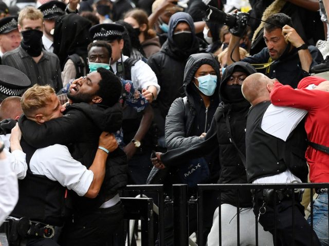 Fists fly as MAYHEM engulfs Downing Street during anti-racism rally (VIDEOS)