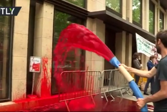 Extinction rebellion activists hose business association HQ with FAKE BLOOD to denounce ‘cynical lobbyists’