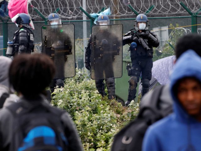 French police DESTROY Calais migrant camp and send over 500 to reception centers